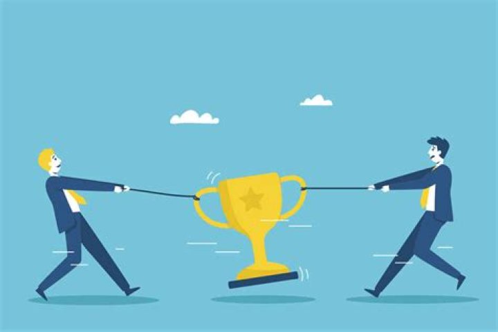 How do businesses compete with one another when they are in close proximity?