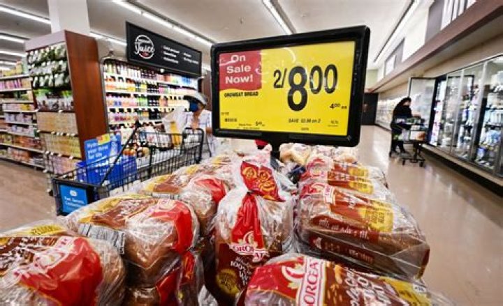 How do grocery stores make money from coupons?
