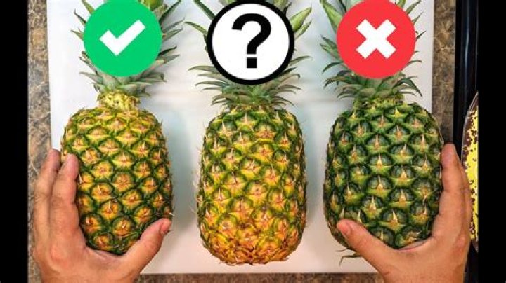How do you know when a pineapple is ready to pick?