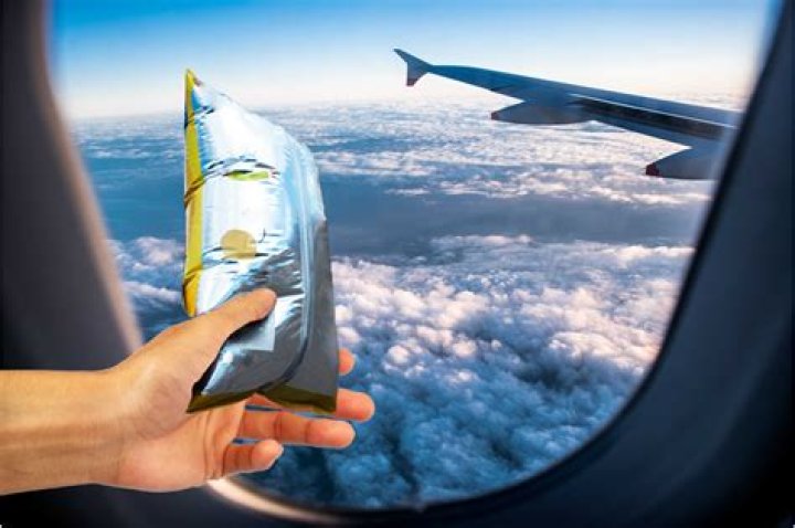 How do you turn a crisp packet into a keyring?