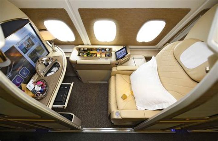 How much does it cost to fly first class to Australia?