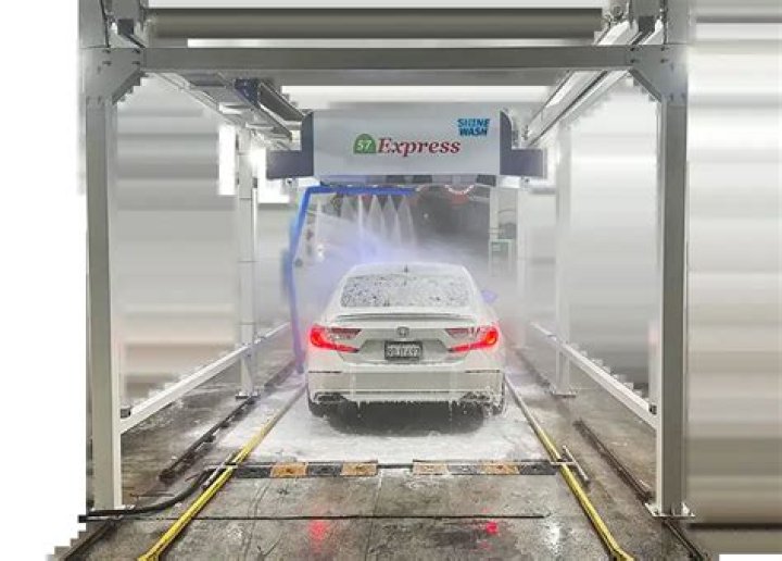 How much water is used in an automatic car wash per wash?
