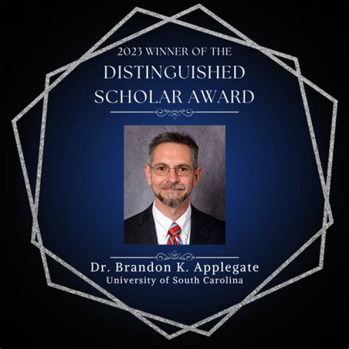 What is a distinguished scholar?