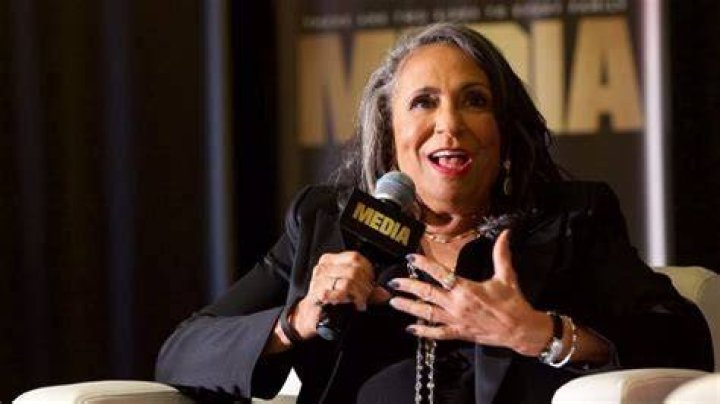 What is Cathy Hughes known for?
