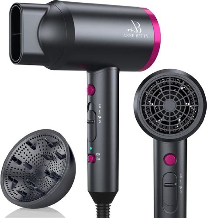 When did handheld hair dryers become popular?